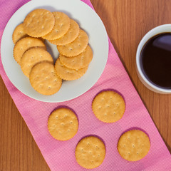 crackers biscuits on wooden background