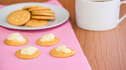 crackers biscuits on wooden background