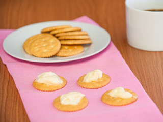 crackers biscuits on wooden background