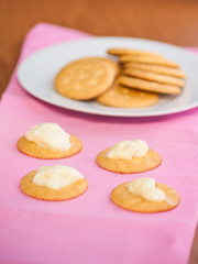 crackers biscuits on wooden background
