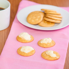 crackers biscuits on wooden background