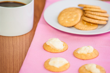 crackers biscuits on wooden background