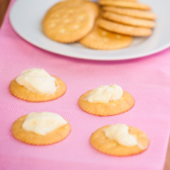 crackers biscuits on wooden background