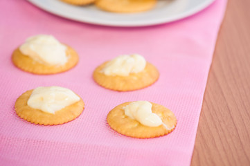 crackers biscuits on wooden background