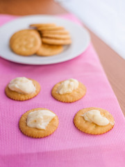crackers biscuits on wooden background