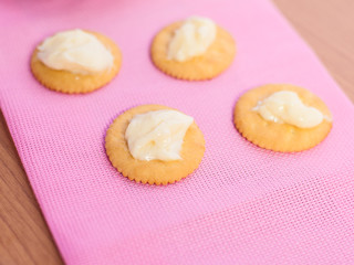 crackers biscuits on wooden background
