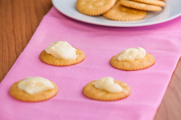crackers biscuits on wooden background