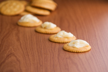 crackers biscuits on wooden background