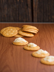 crackers biscuits on wooden background