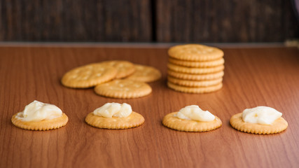 crackers biscuits on wooden background