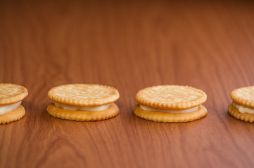 crackers biscuits on wooden background