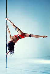 Pole dancing woman