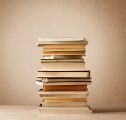 A stack of books with vintage background