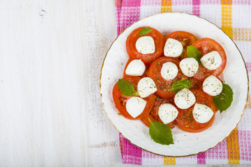 Caprese salad on a wooden table