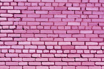 Fototapeta na wymiar Weathered pink brick wall texture.