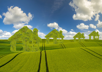 Koncepcja ekologicznych,zielonych domów na tle błękitnego nieba
 - obrazy, fototapety, plakaty