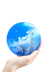 手と地球儀