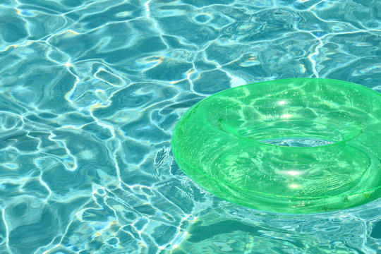 swimming pool, water and lifesaver in inflated rubber