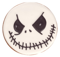 Funny beautiful delicious ginger biscuits Halloween in form a terrible of the face (Ghost), isolated on white