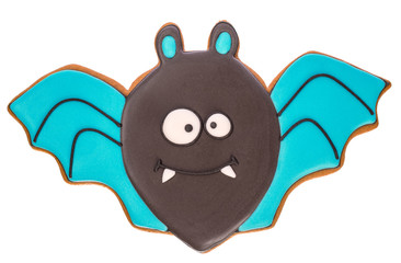 Funny delicious ginger biscuits for Halloween in the shape of a  bat, isolated on white