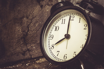 8 o'clock retro vintage clock brown color tone.