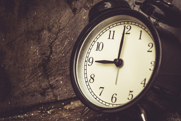 9 o'clock retro vintage clock brown color tone.