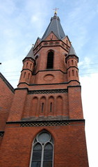 Fototapeta na wymiar Bell tower of the church of the Sacred Heart in Copenhagen, Denmark