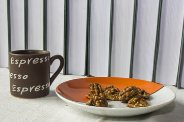 orzech włoski i książki,  Walnut in book background. © Krzysztof Matloch
