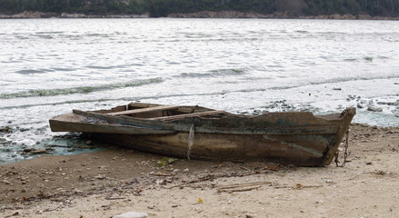 
Old broken boat on the river