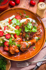 Chicken in tomato sauce with rice and green beans