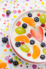 Delicious milky vanilla pudding colorful fruit