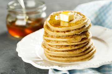Pancakes with butter and honey