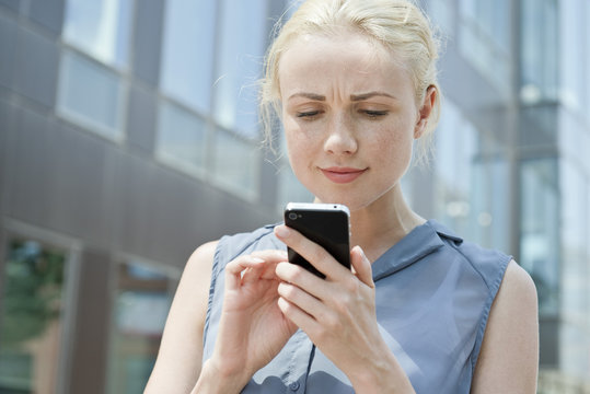 Young woman using smartphone