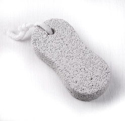 white pumice stone with rope