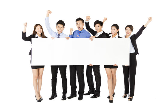 young Business  group holding  blank white  board