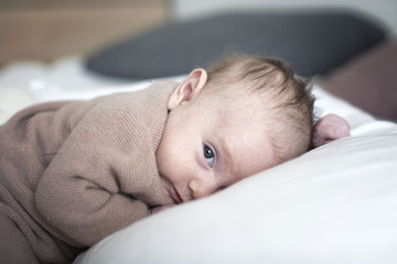 Newborn baby lying down, portrait