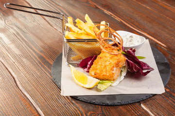 fish with fries and tartar sauce