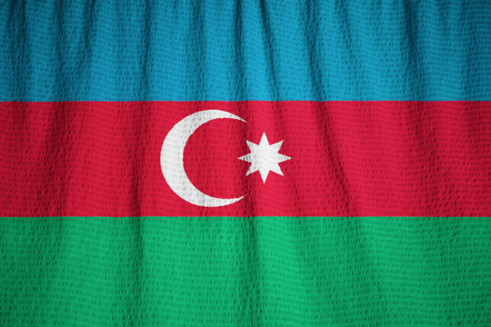 Closeup of Ruffled Azerbaijan Flag, Azerbaijan Flag Blowing in W - Powered by Adobe