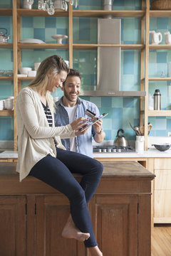Couple shopping online at home