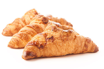 Fresh croissant on white background
