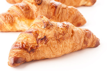 Fresh croissant on white background