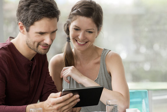 Digital tablets allow friends to easily share photos