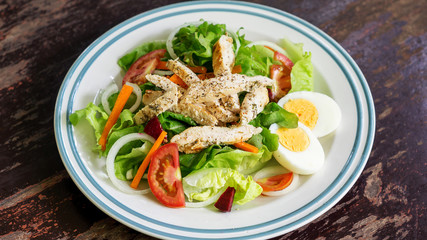 Roast chicken with boiled egg salad.