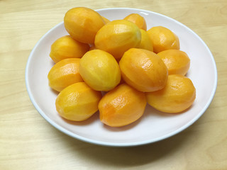 Plango fruit on white dish
