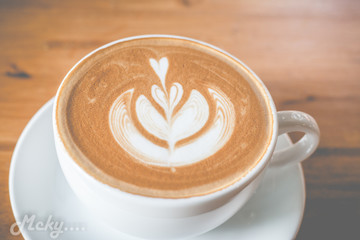 latte coffee on wooden table