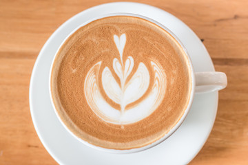latte coffee on wooden table