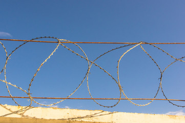 wall with barbed wire