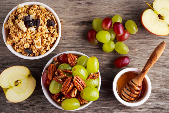 Breakfast Prep With Toasted Oat Clusters, Juicy Raisins, Banana And Pineapple Chunks  Grapes  Pecan Nut.