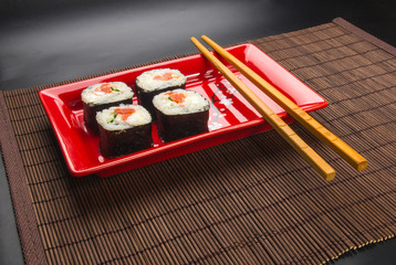 still life - set the rolls on a red plate