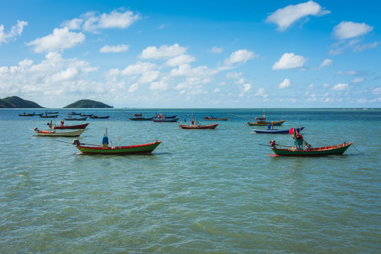 Fishing boats in the sea and a beautiful sky at The  Chao Lao Beach,  Chanthaburi, Thailand.
